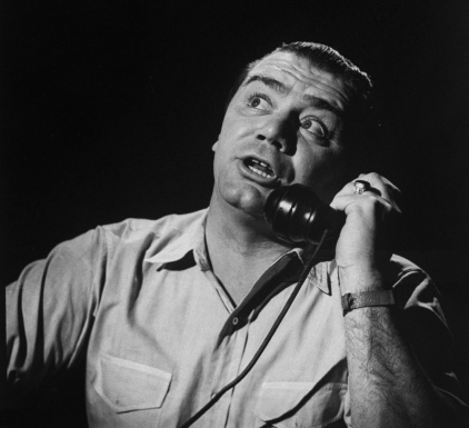 Ernest Borgnine, trying to make a date on phone. (Photo by Allan Grant/The LIFE Picture Collection via Getty Images)