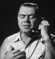 Ernest Borgnine, talking on phone with his eyes shut. (Photo by Allan Grant/The LIFE Picture Collection via Getty Images)